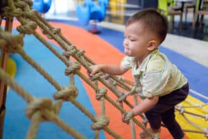 child in session with children's physiotherapist